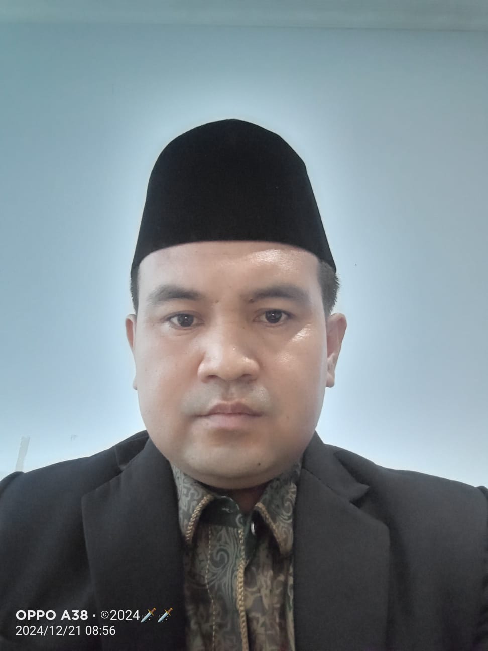Dr. Alrudi Yansah, M.Pd.I.